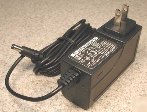 I.t.e. ac adapter power supply au-7970U dc 12V. â€“ 2A.