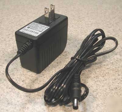 Apd ac adapter power supply wa-24C12U dc 12V. â€“ 2A.