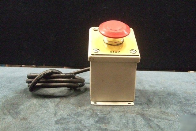 Hand manufactured emergency stop button