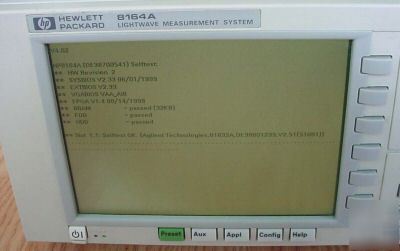 Hp 8164A lightwave measurement system w/ 81680A +81632A