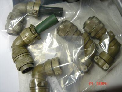 Various mil spec circular conn. right angle plugs